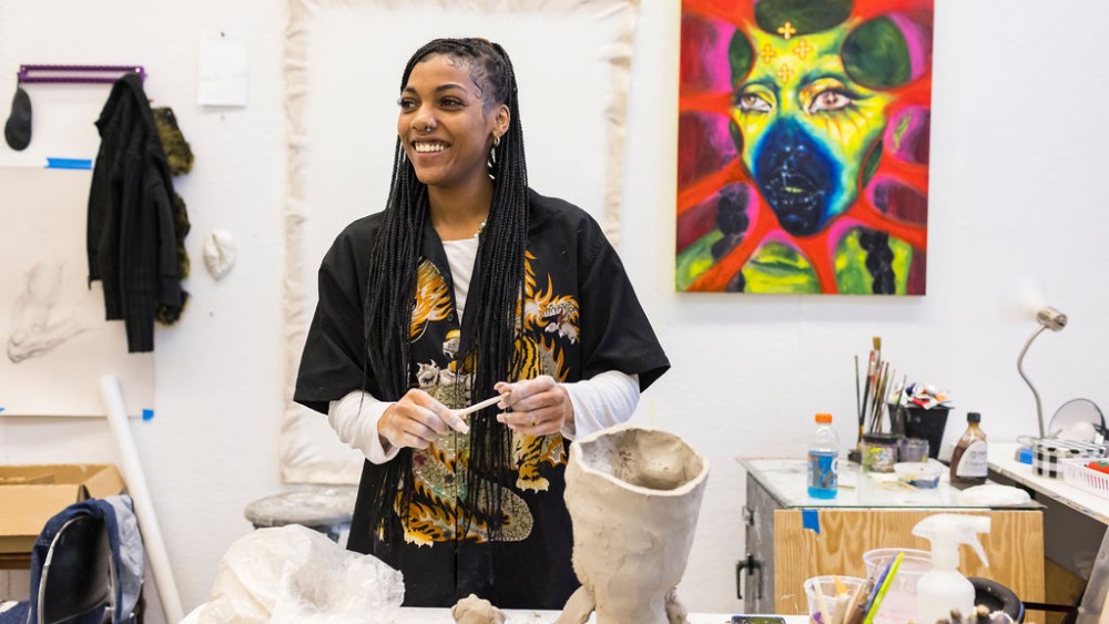 student in painting studio