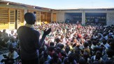 Children gather in the WATERBANK School courtyard