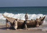 Beaching a cargo ferry, Salalah. Charles Butt, 1969