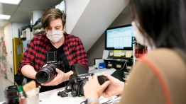 Student checking out a medium format camera