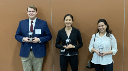 Image of students and their awards.