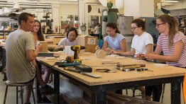 Joe Riley leads a woodworking workshop. Photo by João Enxuto.