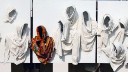 Detail: 'Orange Scarf Goes to Heaven' (2013) by Peju Alatise