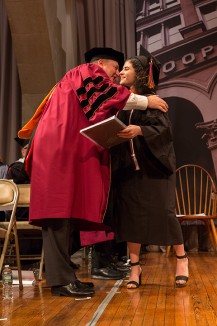 Devora Najjar ChE'16, the first student representative to the board, gets a hug from board member Jeffery Hersch EE'87