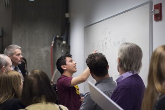 Acting President Bill Mea and guests listened to Jean Dominique Bonnet's (CE'17) presentation