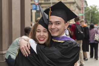 Gisel Orizondo AR'15 gets a big hug from Evan C. Burgess AR'15