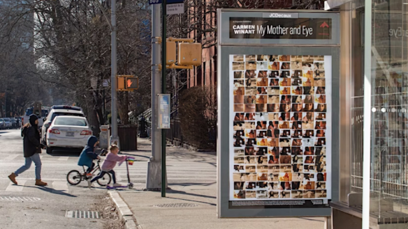 Image of bus stop with Winants photographs